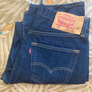 Levi's 501s dark blue, used but barely worn